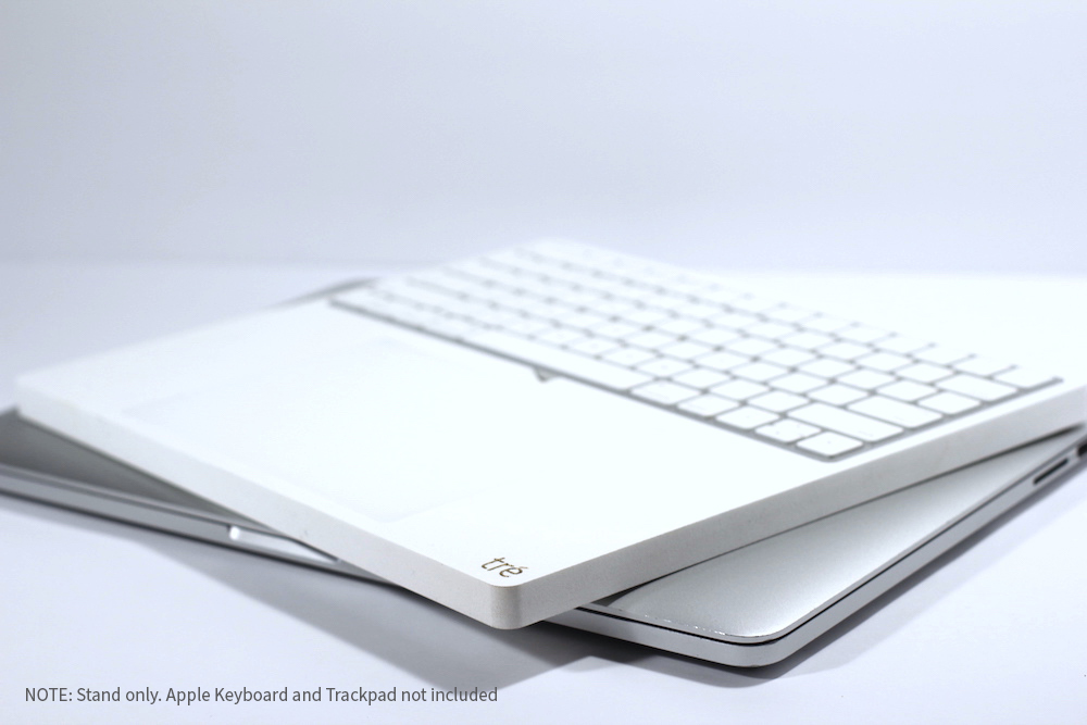 The tré white   Apple Magic Trackpad 2 and Keyboard Tray Dock